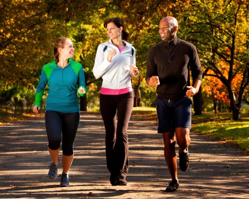 Three people on an afternoon walk