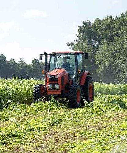 Farmer driving a tractor 